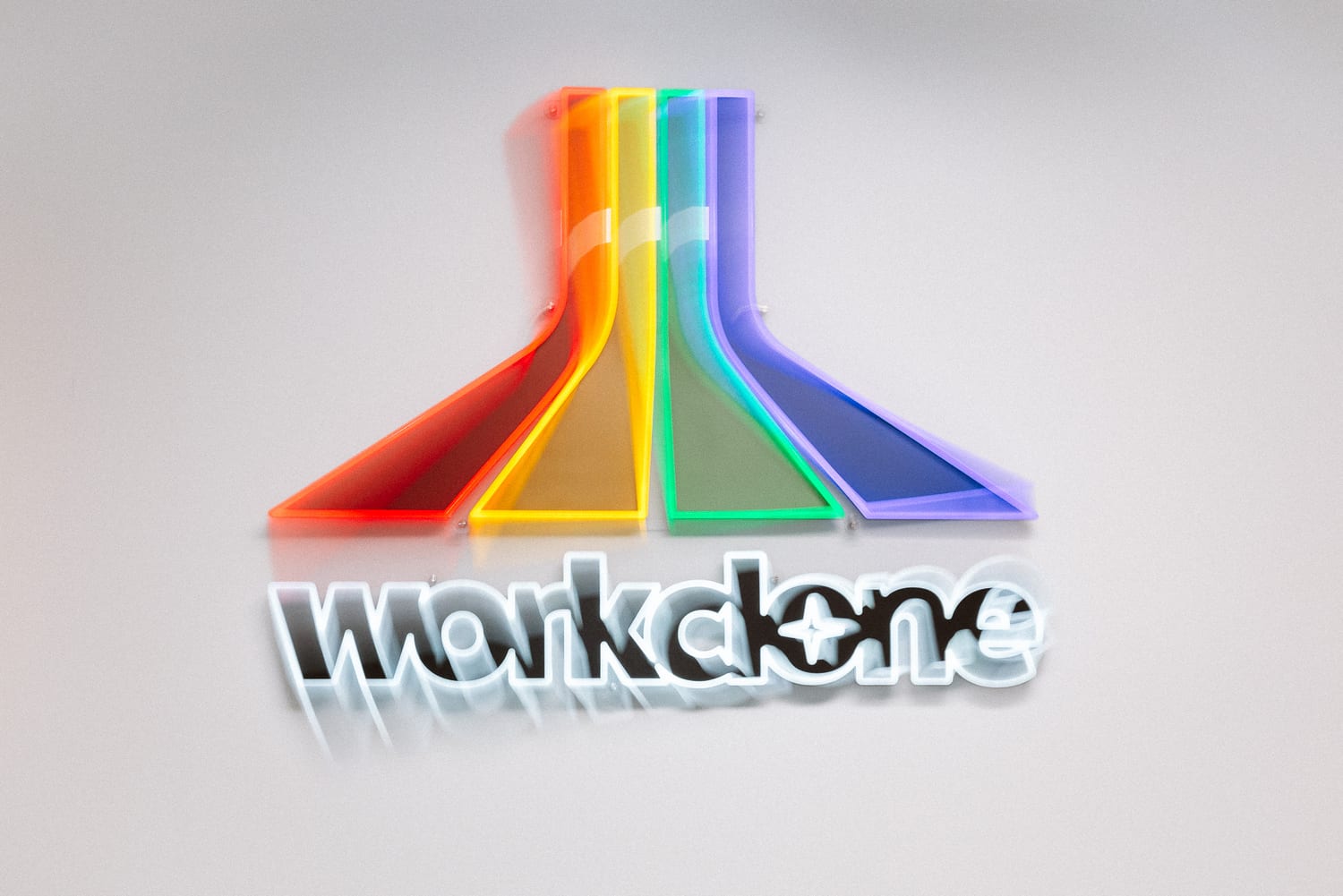 The WorkClone rainbow logo in the studio
